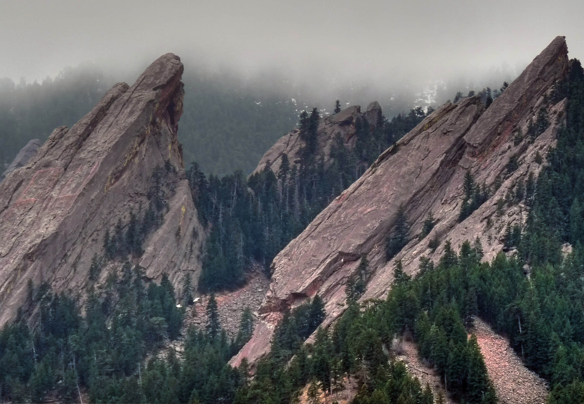 Boulder flatirons in fog